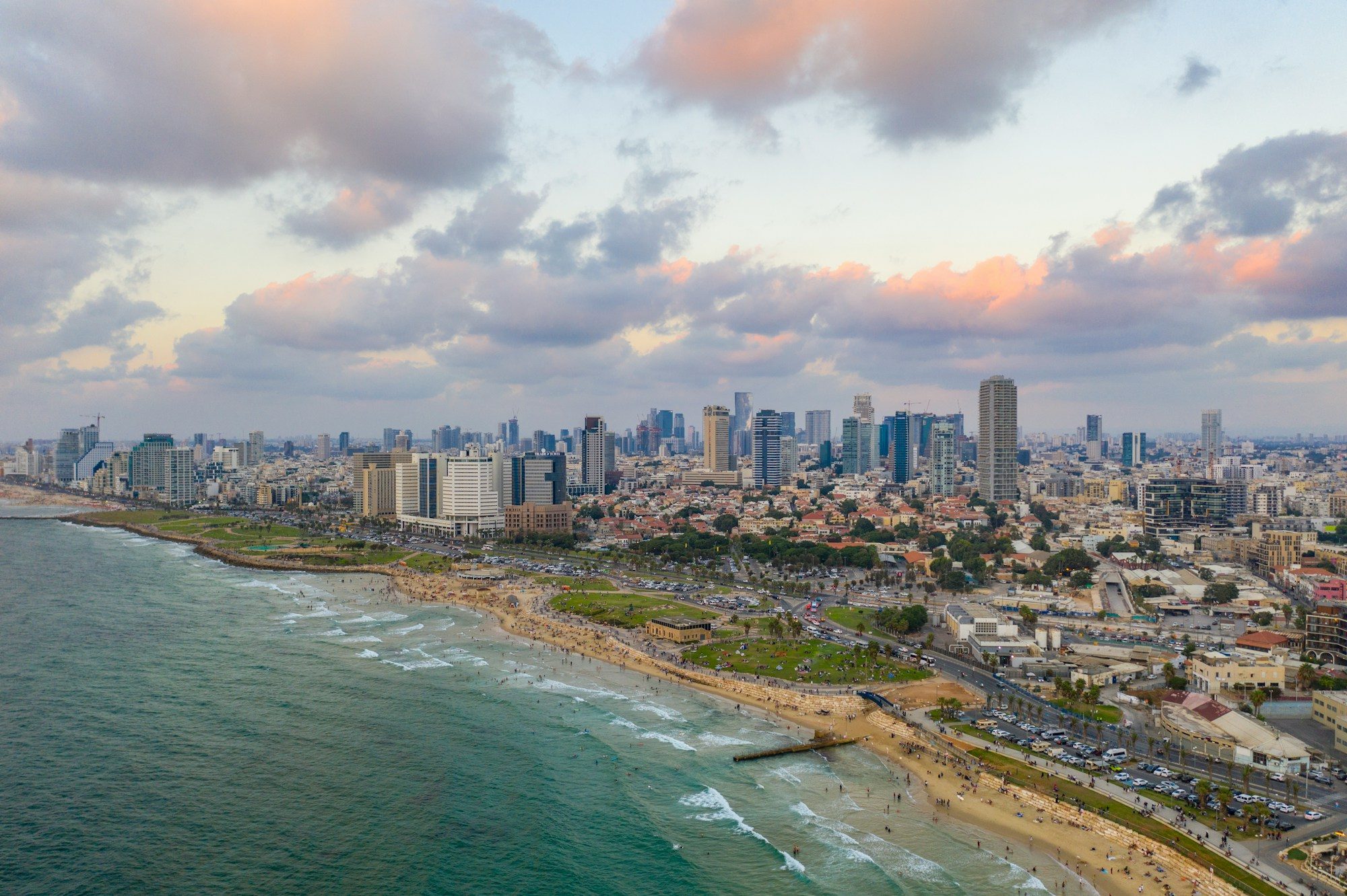 Tel Aviv coastline and skyline at dusk seen from above